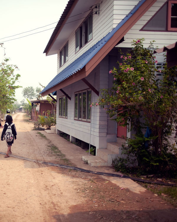 Photography of the dirt path next to the Not For Sale house in Thailand.