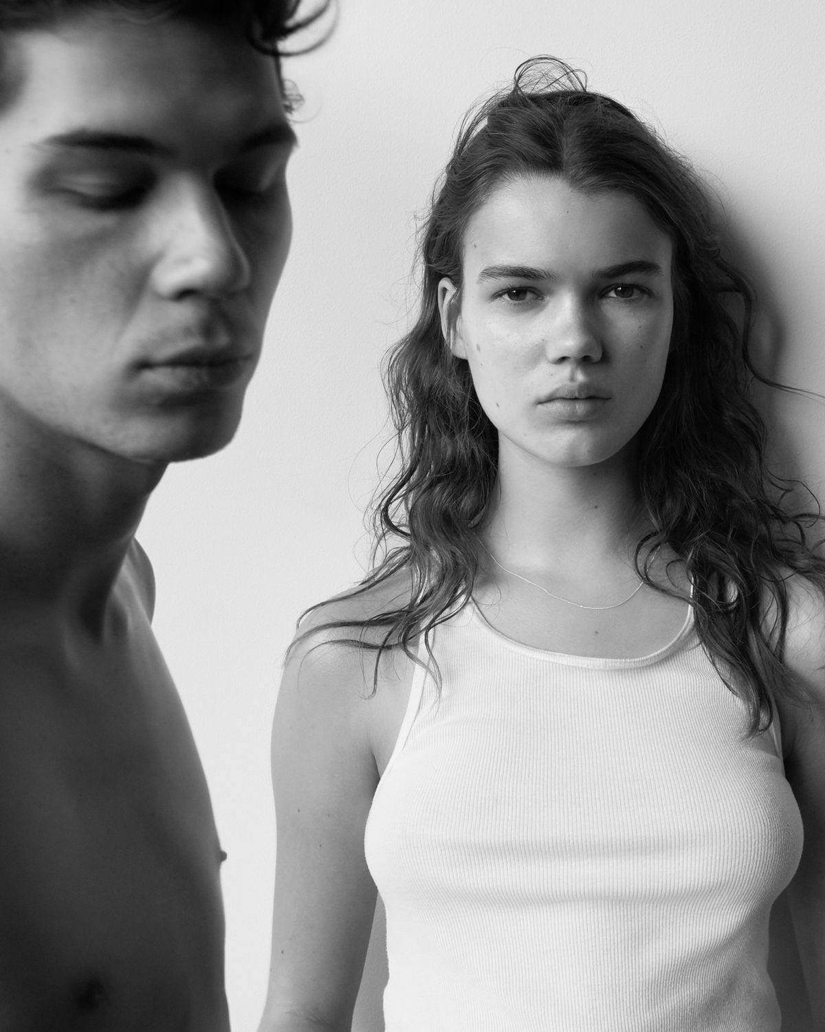 Black and white portrait of a man and a woman.