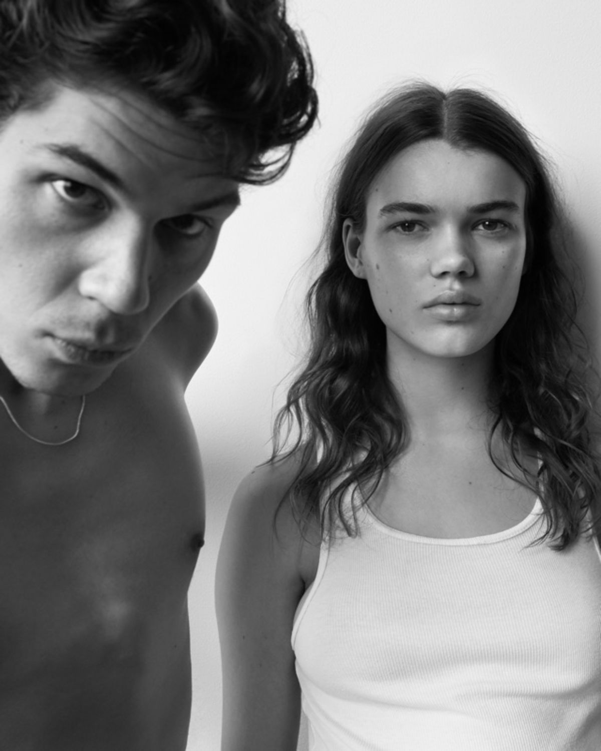 Black and white portrait of a man and a woman.