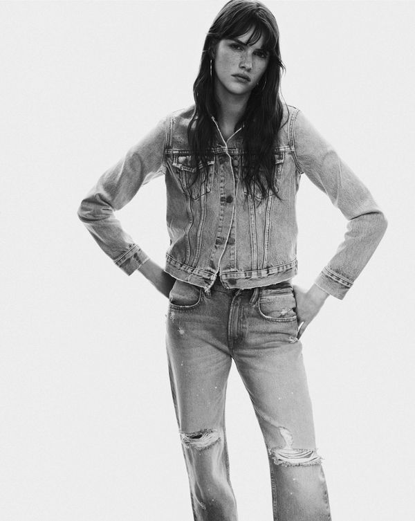 Allsaints Uk Iconic Leather Jackets Clothing Accessories Women S Campaign Image In Black And White Wearing A Denim Jeacket Jeans