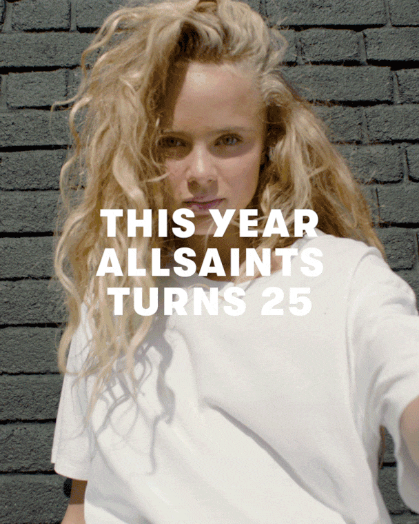 Image of a woman wearing a white t-shirt to promote our 25th Anniversary and competition.