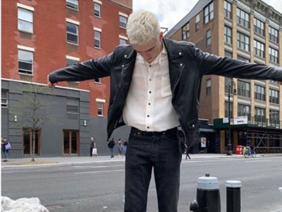 User generated image of a man wearing a black leather jacket.