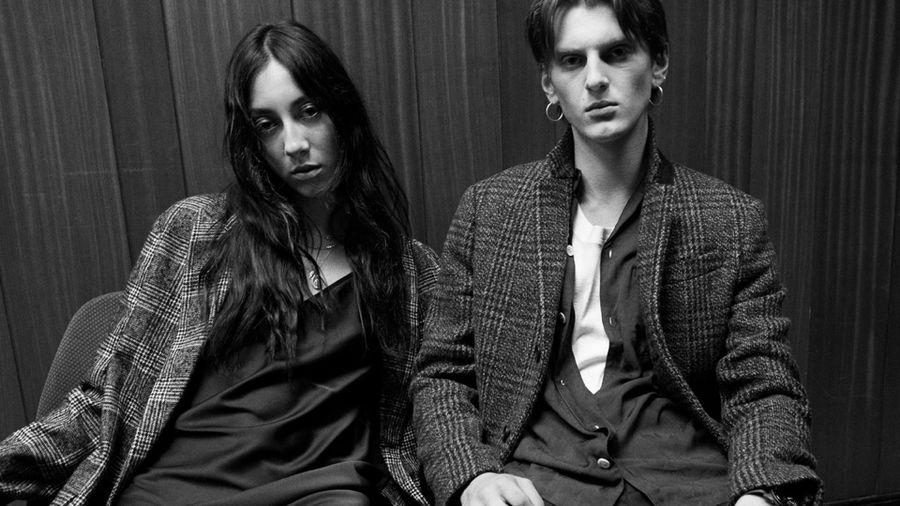 Black and white image of a couple wearing items from our latest collection.