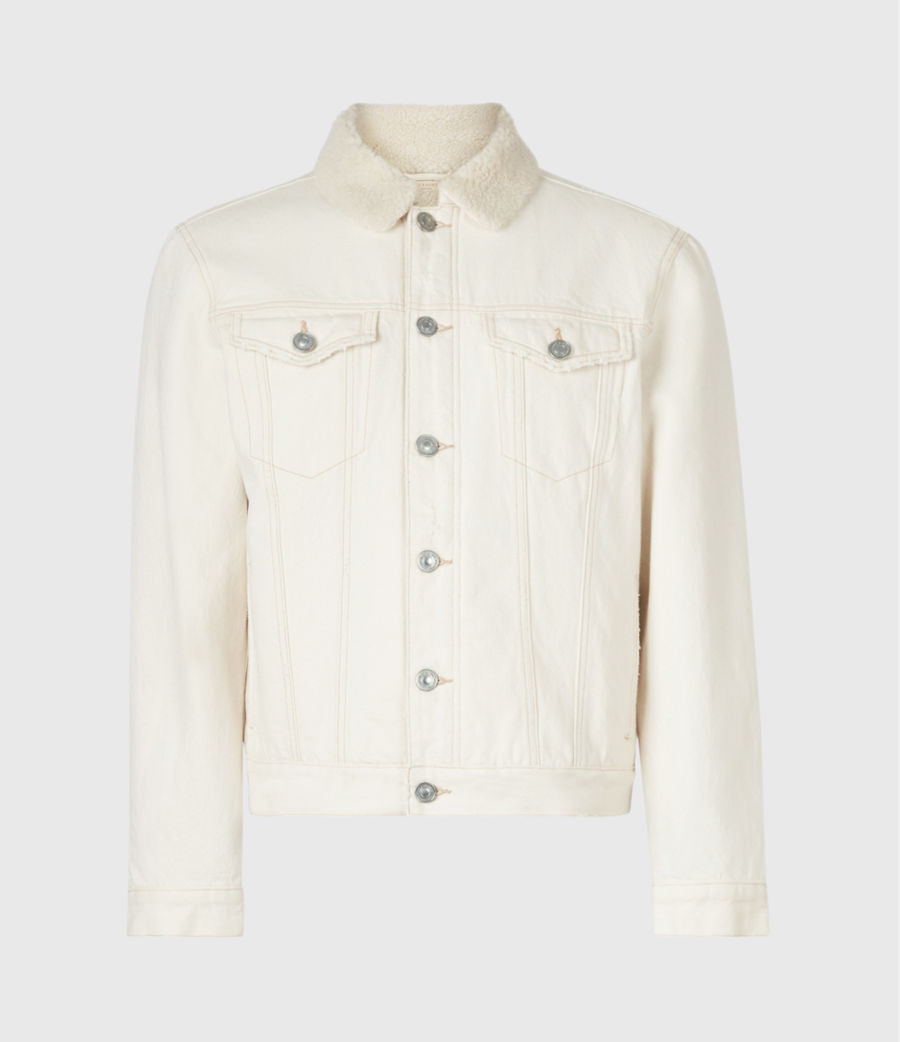 Black and white image of a woman twirling wearing our latest collection.